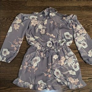 Cold shoulder floral romper.